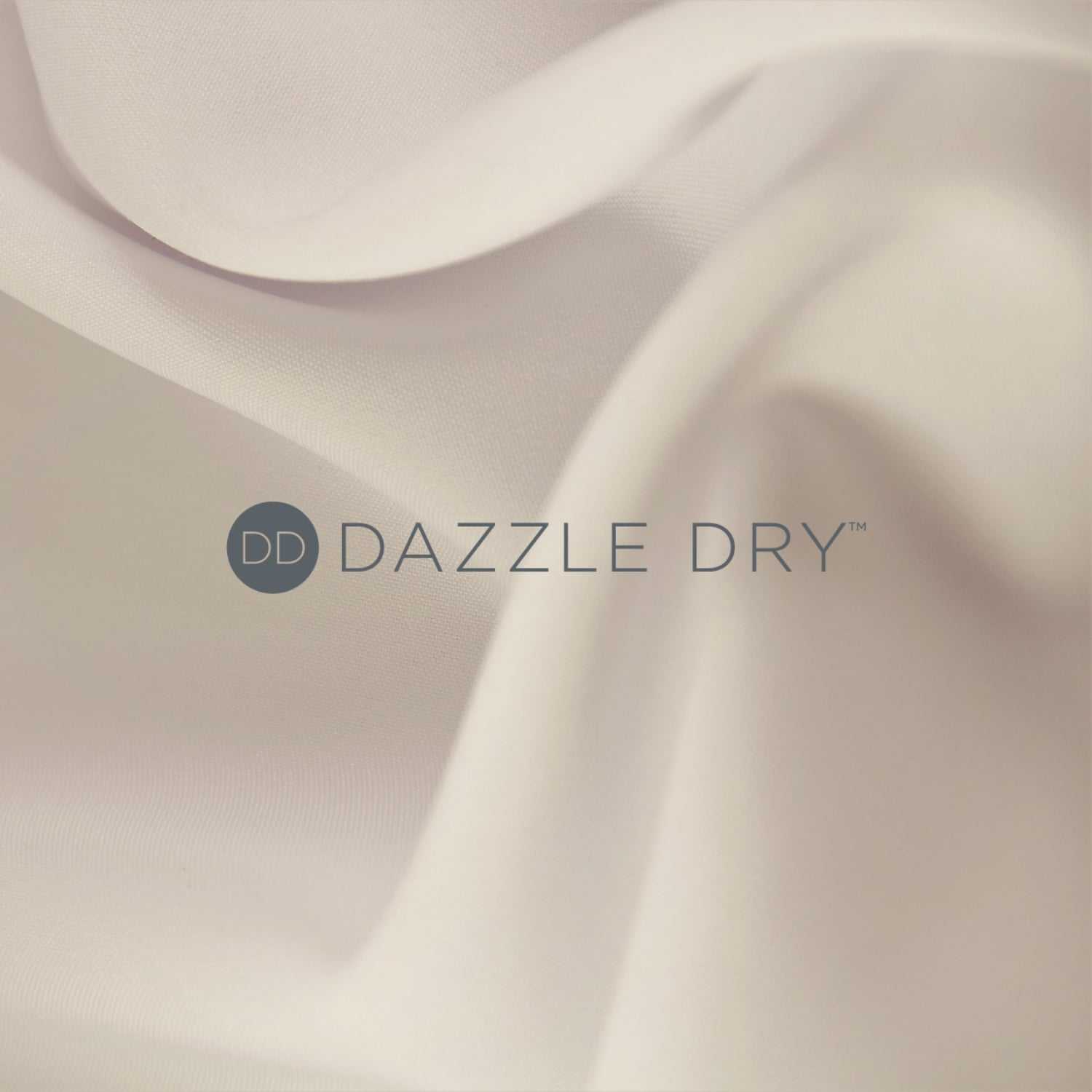 Soft, flowing beige fabric with "DAZZLE DRY" logo centered.